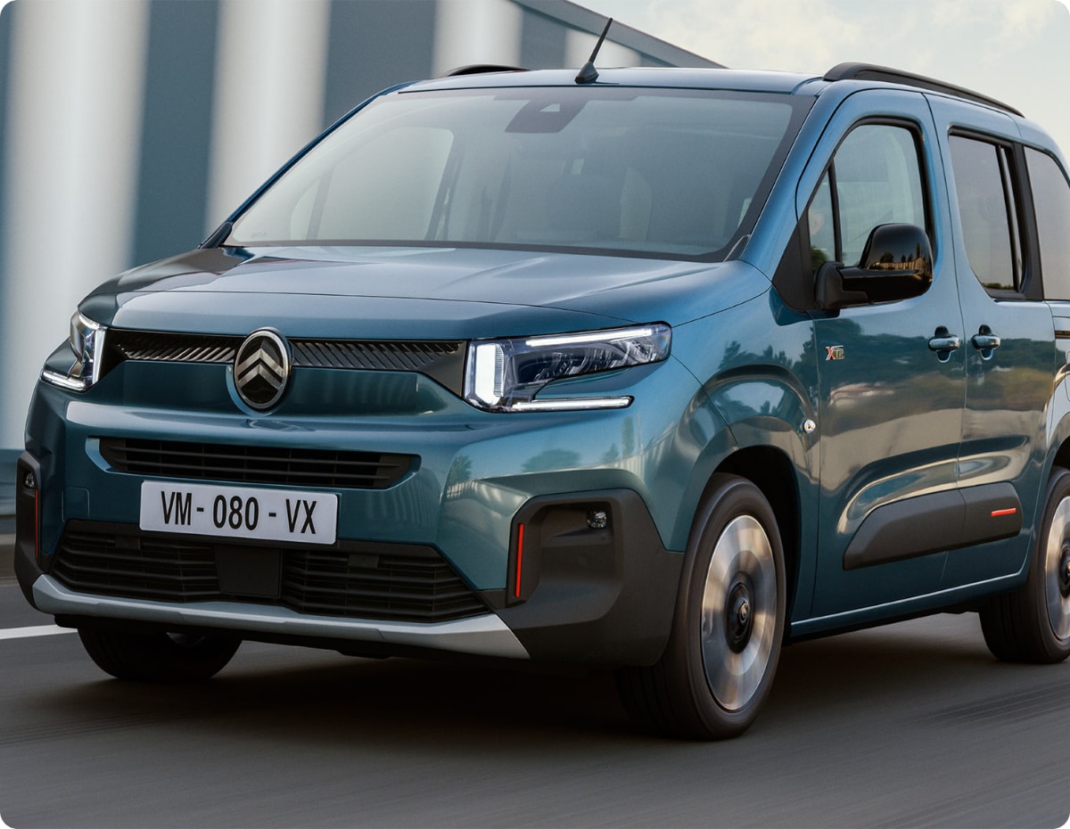 Three‑quarter front view Kiama Blue ë-Berlingo showing design, safety, efficiency and immediate stock availability