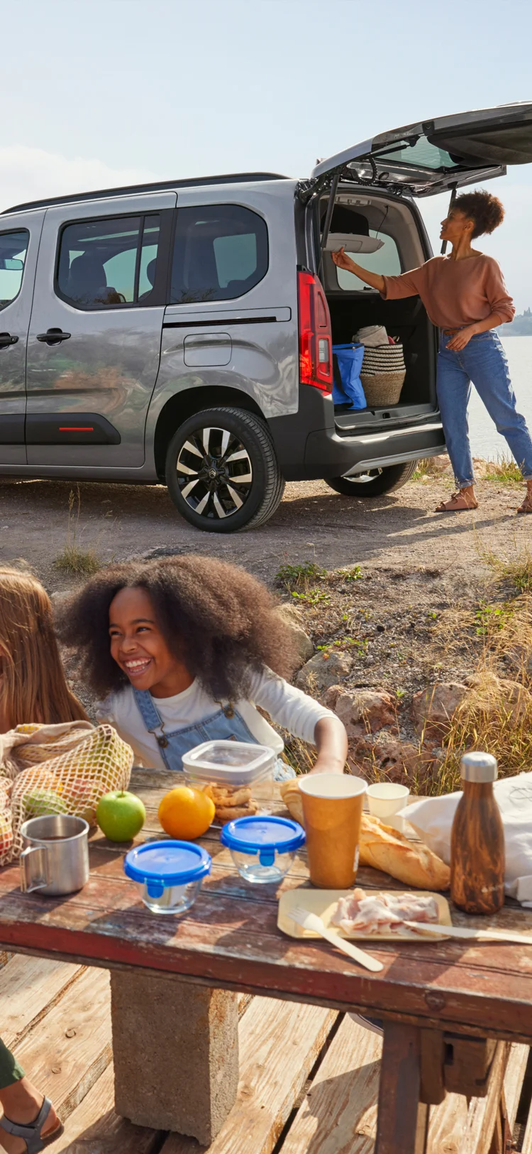 Side view Berlingo with open boot showing spacious loading area, practicality, safety, efficiency and confident family use