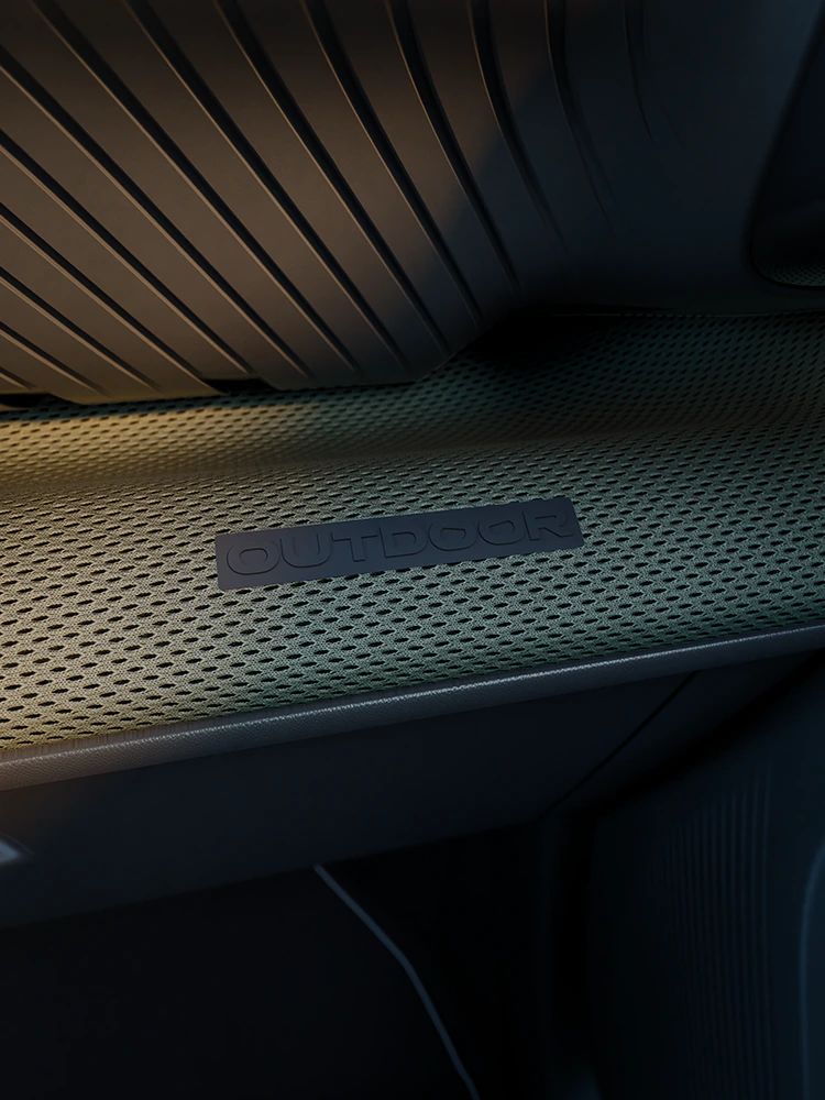 Vista em grande plano do painel de instrumentos com acabamentos «Outdoor», que apresenta o interior do SUV compacto Advanced Comfort
