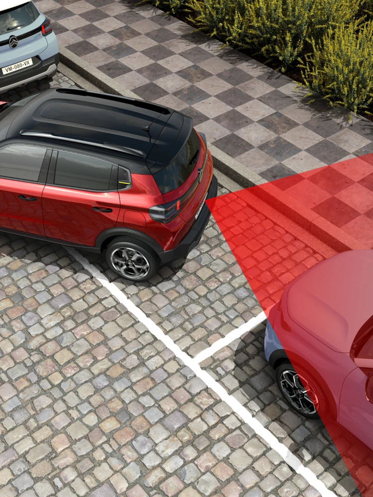 Vista superior do SUV elétrico Citroën ë-C3, mostrando os sensores de estacionamento traseiros para manobras urbanas mais seguras, confiantes e acessíveis.