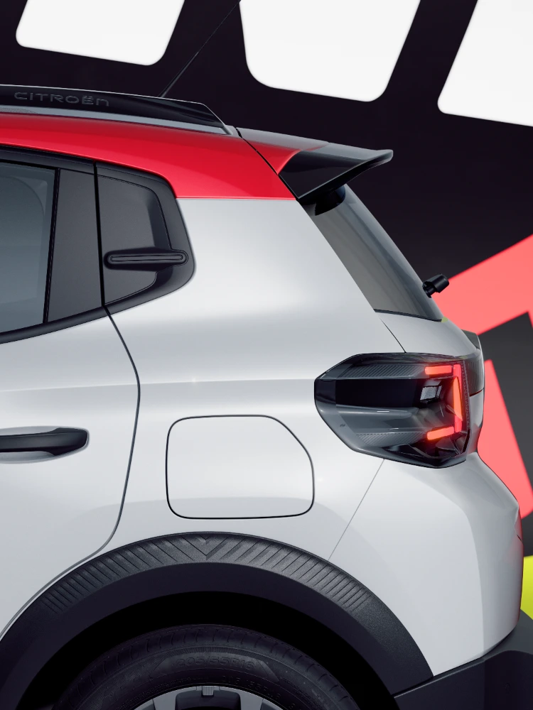 Vista traseira detalhada do Citroën ë-C3 TONIC, carro elétrico urbano de edição limitada: luzes traseiras e design da traseira, uma alternativa moderna de veículo elétrico
