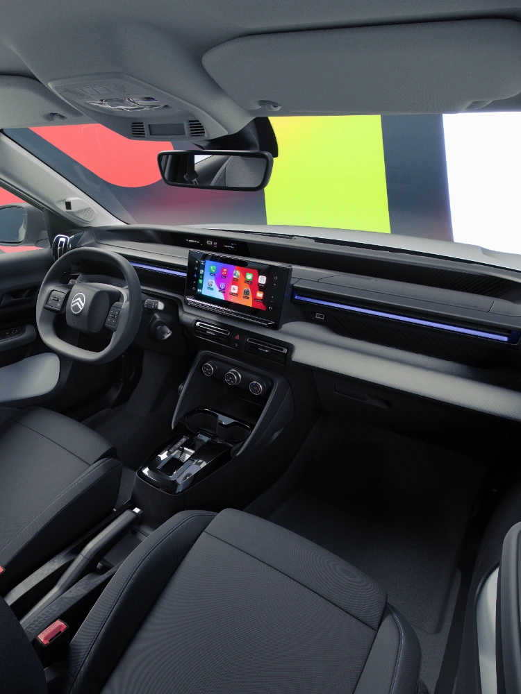 Vista do interior do habitáculo do Citroën ë-C3 TONIC, edição limitada, carro elétrico urbano: ecrã tátil de 10'' e painel de instrumentos, alternativa de veículo elétrico conectada