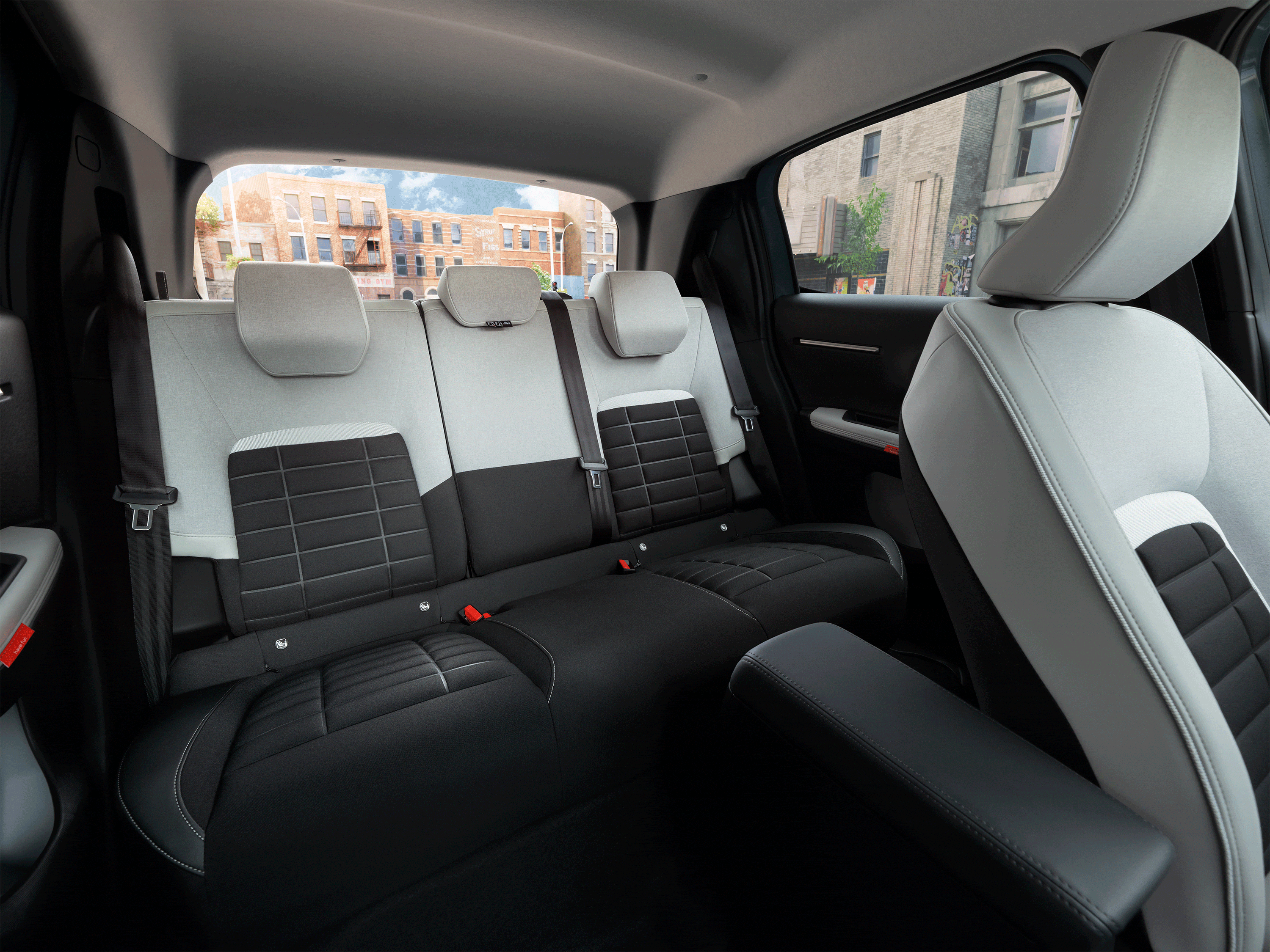 Vista interior do automóvel compacto Citroën C3, destacando os ajustes de conforto dos bancos para uma mobilidade diária mais suave e acessível.