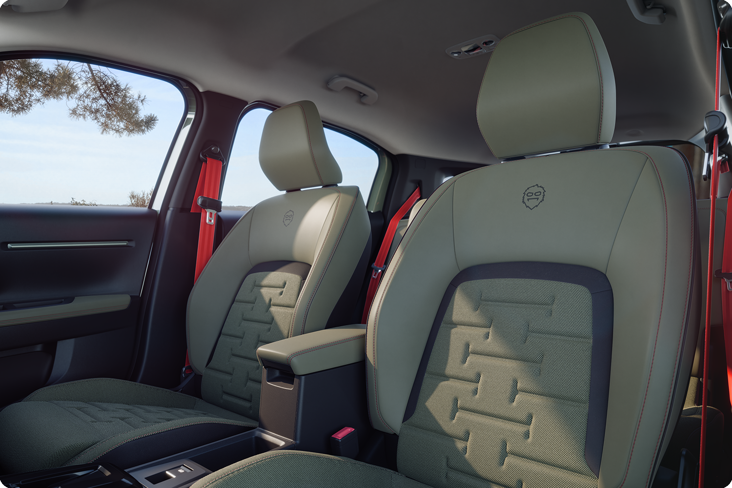 Grande plano dos bancos traseiros do Citroën C3 Aircross Outdoor com cintos de segurança vermelhos, que oferecem conforto, espaço e um design revigorante para todos