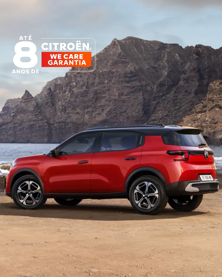 Rear three‑quarter coastal view of Citroën C3 compact SUV highlighting award‑winning design and 8‑year warranty for confident, affordable mobility.